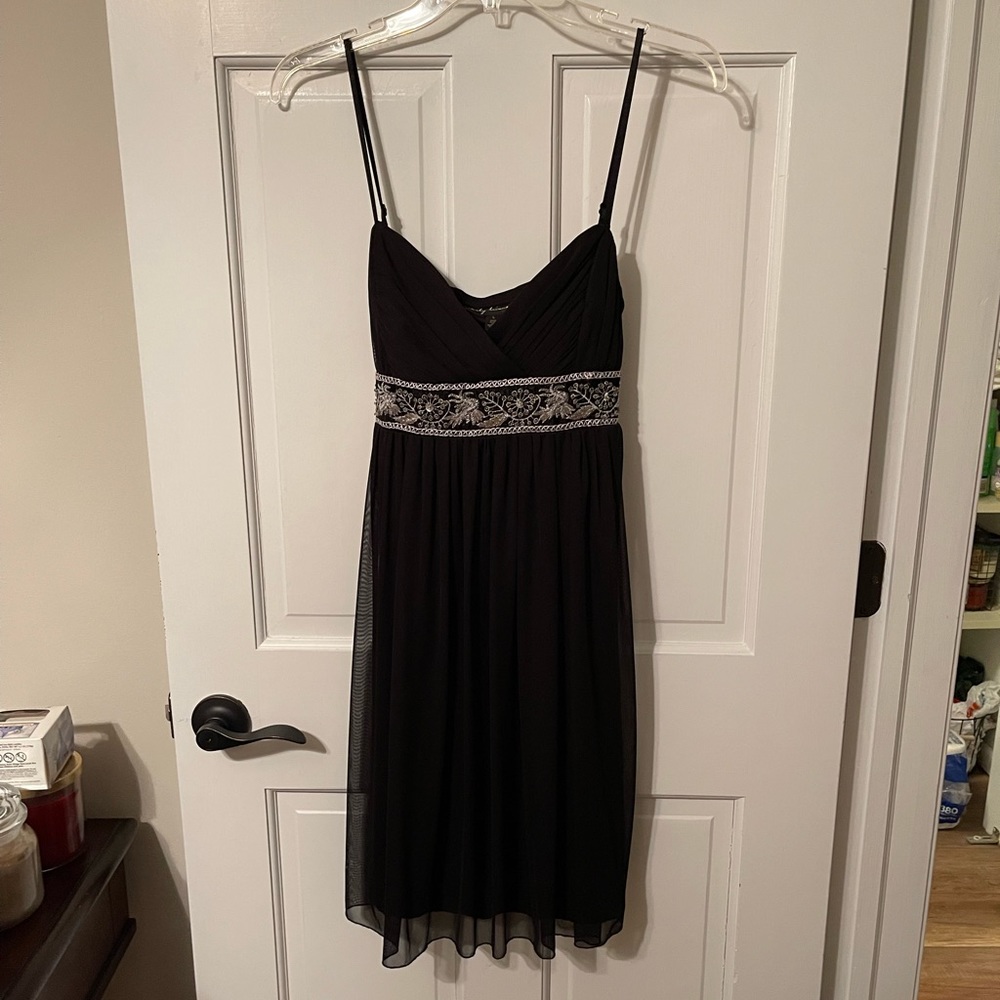 Formal black spaghetti strap belted dress